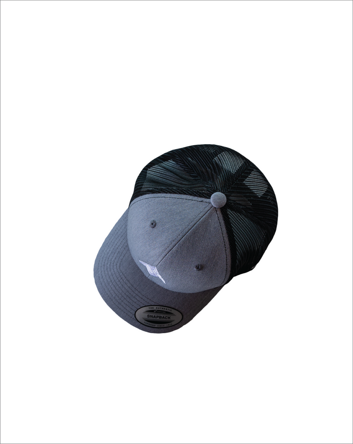 Image from the top of the Send It Icon trucker hat classic style in heather grey with embroidered logo on the front and the send it phrase embroidered on the mesh. Yupoong authentic classic snap back style. 
